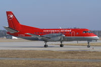 N427XJ @ YXU - Taxiing on Golf - by topgun3