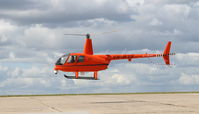 VH-WYS @ YMEN - R44 in hoover at Essendon - by Mick Paul