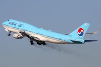 HL7492 @ LAX - Korean Air HL7492 (FLT KAL18) climbing out from RWY 25R, trailing brake dust from the main gear, enroute to Incheon Int'l (RKSI) - Seoul, South Korea.