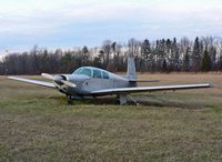 N2550W @ N75 - This poor Mooney does not appear to have flown for a while.  The aircraft is owned by the manager of this little airport.  I am hoping the best for both. - by Daniel L. Berek