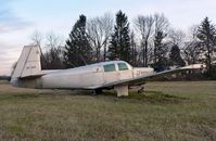 N2550W @ N75 - This poor Mooney does not appear to have flown for a while.  The aircraft is owned by the manager of this little airport.  I am hoping the best for both. - by Daniel L. Berek