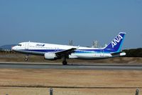 JA8381 @ ITM - Just landing RWY32L.