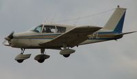 N715FL @ IPT - Just ove the fence.  The cross was giving them a good time.  Arriving for lunch - by Sam Andrews