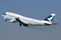 B-HKF @ LAX - Cathay Pacific B-HKF (FLT CPA885) climbing out from RWY 25R, trailing brake dust, enroute to Hong Kong Int'l (VHHH). - by Dean Heald