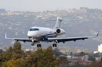 N523FX @ SMO - 2005 Bombardier Challenger 300 operated by FlexJet, over the numbers on RWY 21 after a transcontinental flight from Teterboro Airport (KTEB), New Jersey. - by Dean Heald