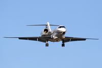 N933QS @ SMO - NetJets Aviation N933QS (2000 Cessna 750 Citation X) from Kona Int'l at Keahole (PHKO), on short-final to RWY 21.