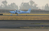 N623CD @ LVK - Helsing Group 2005 Cirrus Design SR22 landing @ Livermore Municipal Airport, CA - by Steve Nation