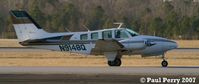 N9148Q @ ISO - Taxiing out, to make her departure into the sunset