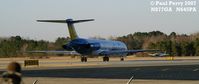 N877GA @ ISO - Not exactly clash of the titans, just showing some local color before the flight