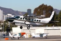 N53U @ SMO - 2000 Cessna 208B N53U climbing out from RWY 21. - by Dean Heald