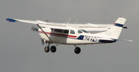 N2874B @ CRG - Short field take off just prior to a very tight right turn.  It was fun to watch. - by Sam Andrews