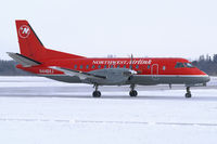 N446XJ @ YXU - Taxiing on Golf - by topgun3