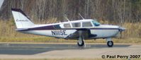 N111SE @ PVG - Out on the edge of the large GA parking - by Paul Perry