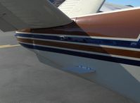 N1539Z @ SZP - 1961 Beech P35 BONANZA, Continental IO-470-N 260 Hp, mods-ruddervator leading edge cuffs, fixed airflow plates, ventral fin - by Doug Robertson