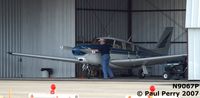 N9067P @ PVG - Post-flight clean up in the hangar - by Paul Perry