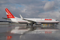 OE-LNS @ VIE - Lauda Air Boeing 737-800 - reflection - by Yakfreak - VAP