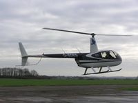 G-EDES @ EGSN - Robinson R44 landing at Bourn - by Simon Palmer