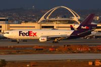 N399FE @ LAX - FedEx N399FE (FLT FDX3154) from Fort Worth Alliance (KAFW) about to exit RWY 25R after landing late in the day.
