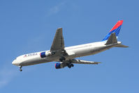N133DN @ ATL - On final for Runway 26L - by Michael Martin