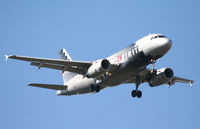 N521NK @ ATL - On final for Runway 9R - by Michael Martin