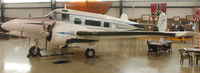 N5609D @ HBI - 1957 Beech E18S at N.C. Aviation Museum at the Asheboro N.C. airport. - by Richard T Davis