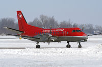 N447XJ @ YXU - Taxiing on Golf - by topgun3