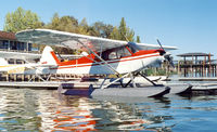 N6988B - On floats at Clear Lake - by Bill Larkins