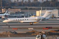 N63HS @ LAX - 2004 Gulfstream G-V(SP) G550 N63HS rolling out on RWY 25R after landing.