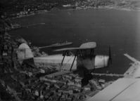 F-BHGS - over Ajaccio harbor (Corsica) pilot unknown, instructor Jacques PICAN - by pat