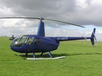 G-INDX @ EGBK - Robinson R44 visiting Sywell for BHAB meeting - by Simon Palmer