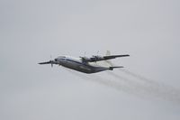 UR-UCK @ LOWW - Antonov 12-climbing out of rwy29 - by Dieter Klammer