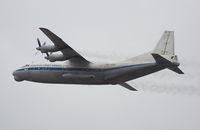 UR-UCK @ LOWW - Antonov 12-climbing out of rwy29 - by Dieter Klammer