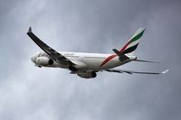 A6-EAA @ LOWW - Climbing out from RWY29 on a stormy day - by Dieter Klammer