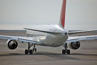 JA8364 @ KIX - backside ;-) - by Micha Lueck