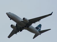 C-FWCN @ MCO - West Jet - by Florida Metal