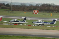 G-BOMO @ EGCC - G-BOMO & G-BGKY Piper Tomahawks - by David Burrell
