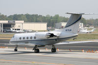 N671LW @ PDK - Taxing to Jet Fueling - by Michael Martin