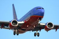 N233LV @ LAX - Southwest Airlines N233LV (FLT SWA900) from William P Hobby (KHOU) on short-final to RWY 24R.