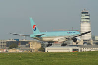 HL7575 @ LOWW - Korean 777 with tower in background.