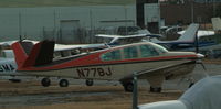 N77BJ @ ISP - Bonanza on the ramp - by Stephen Amiaga