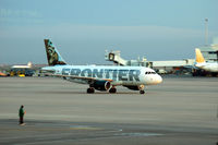 N923FR @ DEN - Heavy Overcast Morning, Light just comming up at DIA, Frontier Airlines - by John Little