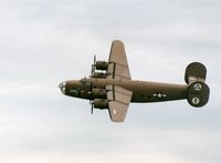 N24927 @ CID - Flying by the  control tower - by Glenn E. Chatfield