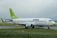 YL-BBK @ EGCC - Air Baltic - Taxiing - by David Burrell