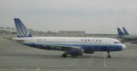 N426UA @ KSFO - United A320 taxi in at KSFO - by John J. Boling