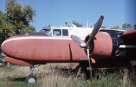 N5548N - Sitting derelict at Lambert Field, near Plainfield, IL - by Glenn E. Chatfield
