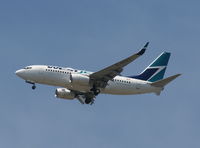 C-GYWJ @ MCO - West Jet - by Florida Metal
