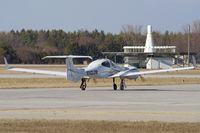 N142JW @ YXU - Taxiing on alpha for departure. - by topgun3