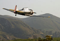 N8540P @ KSZP - AT-6 and Ag-Cat . N7867 has prop removed for overhaul - by pete mason