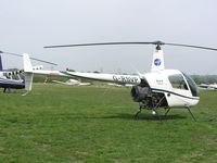 G-RSVP @ EGTR - Robinson R22 - by Simon Palmer