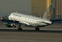 N930FR @ KLAS - Frontier Airlines - 'Cougar' / 2004 Airbus A319-111 - by Brad Campbell